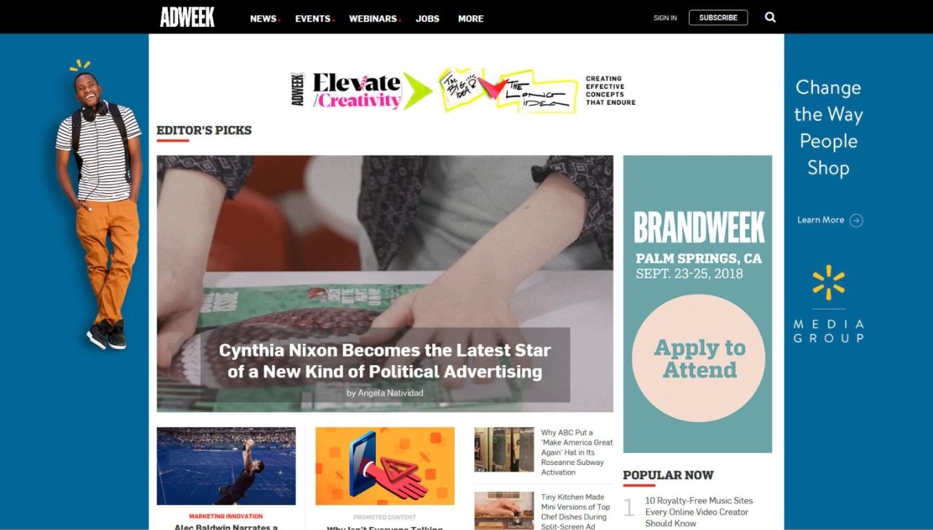AdWeek homepage with a blue Walmart Media Group wallpaper skin reading Change the Way People Shop