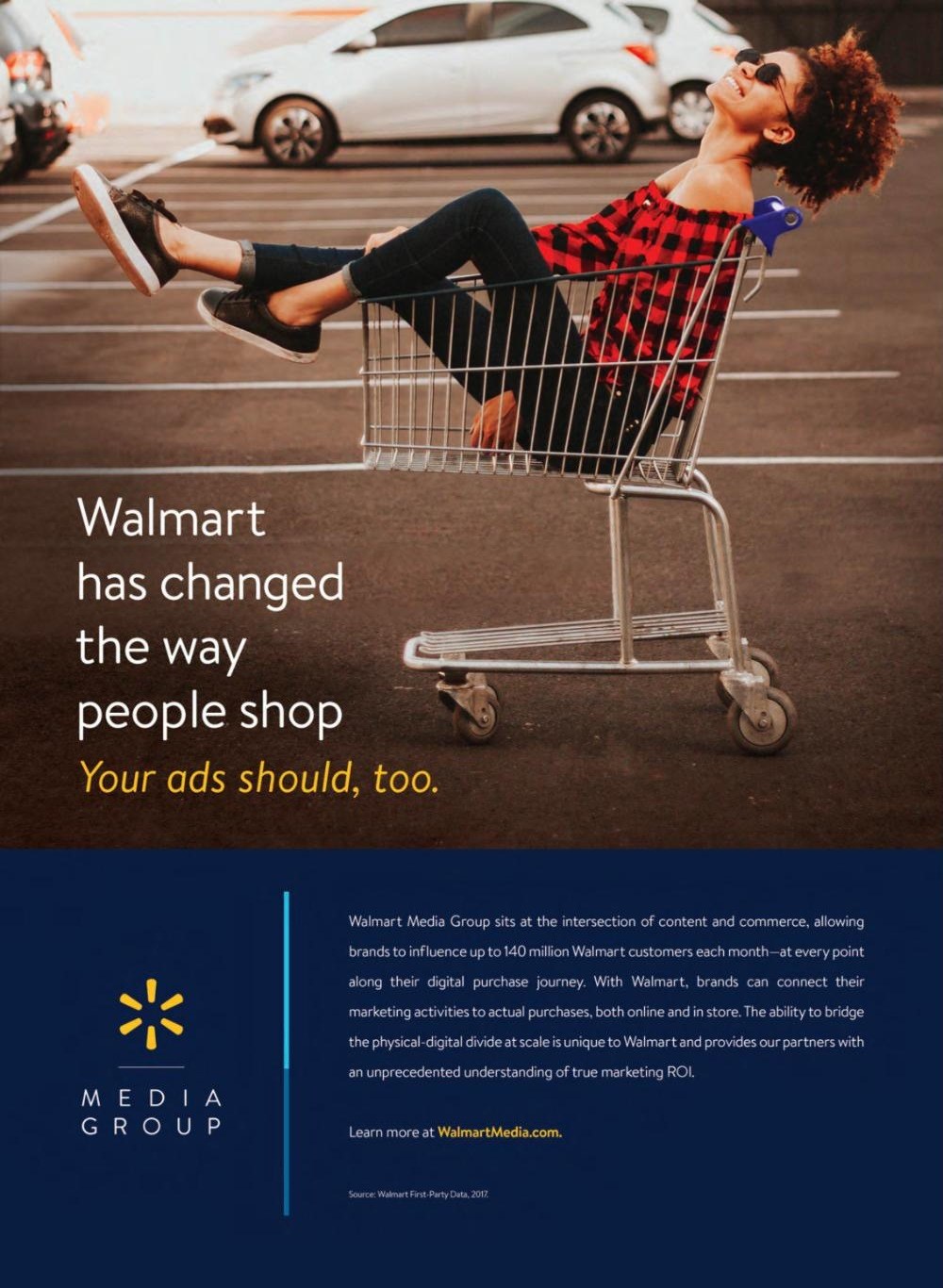 Full-page Walmart Media Group print ad: a woman riding in a shopping cart above the line Walmart has changed the way people shop. Your ads should, too.